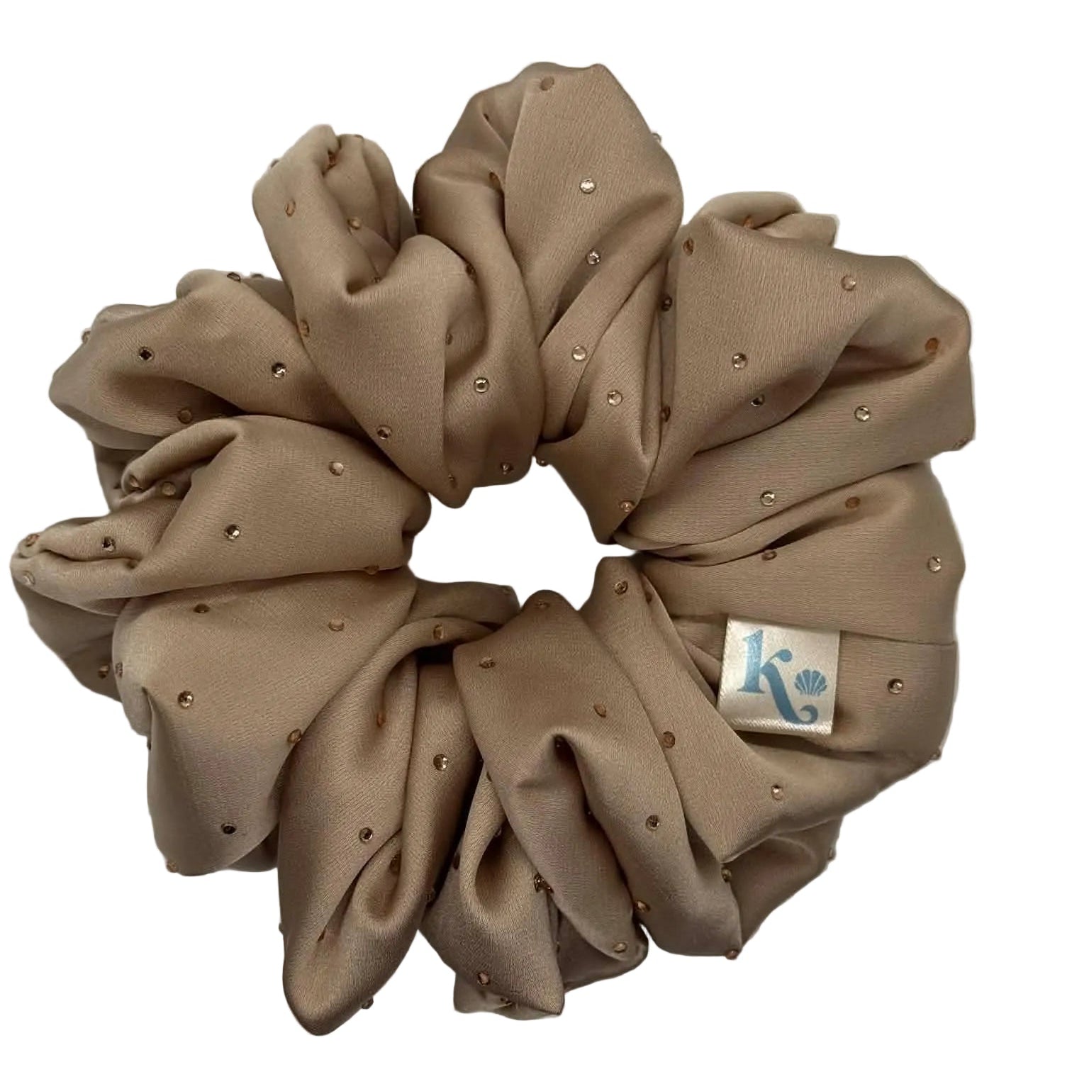 Beige scrunchie with crystal details on a white background