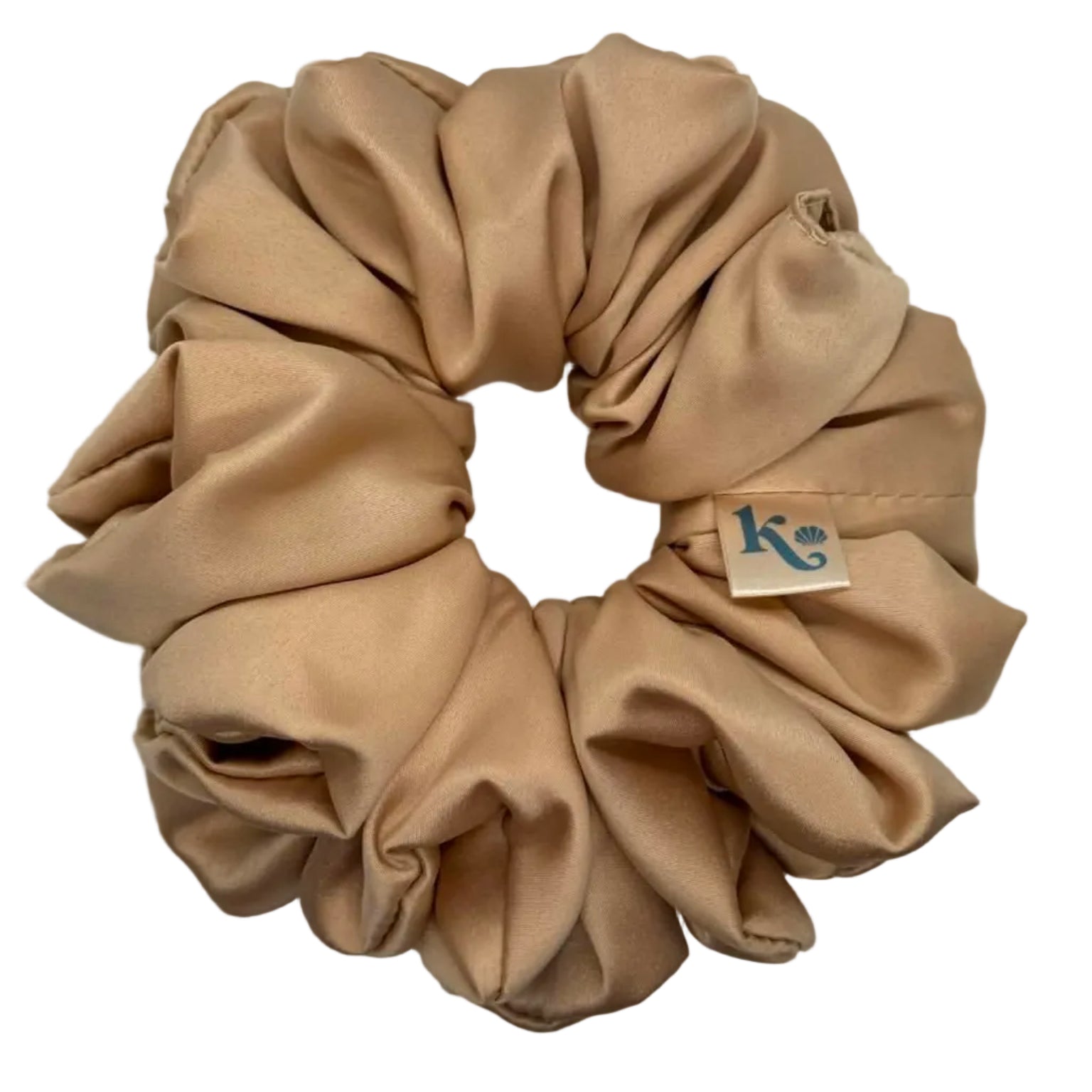 Beige scrunchie on a white background